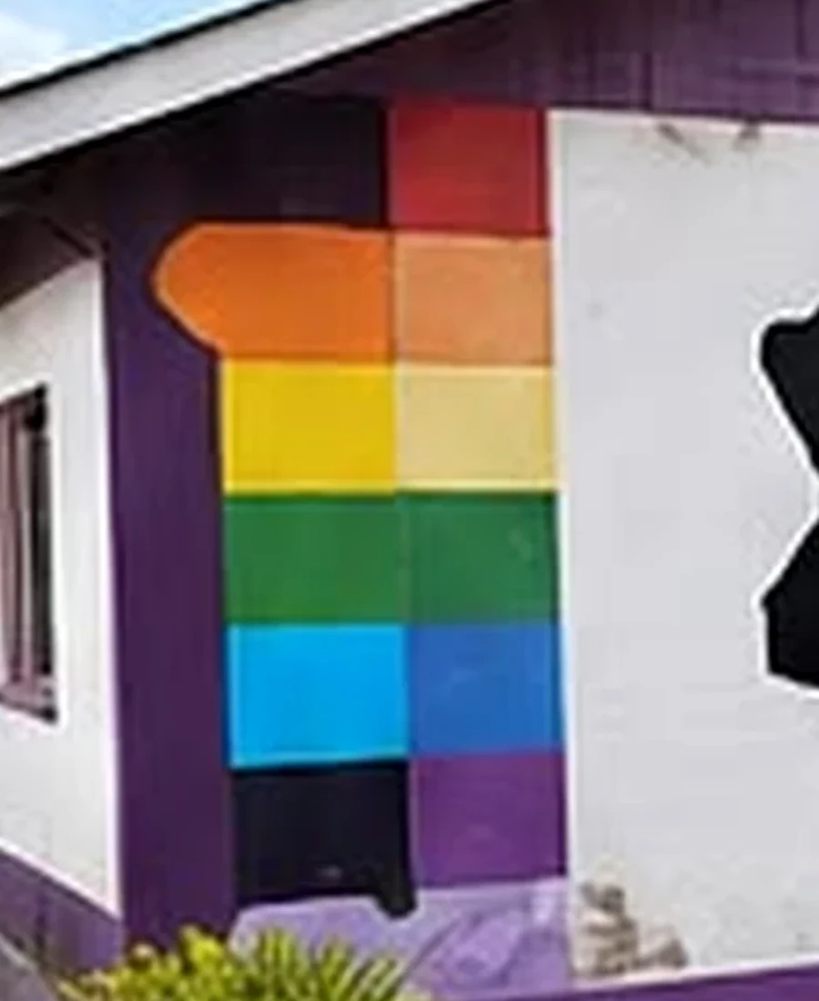 Rainbow-coloured wall at Kenneth & Jacob's House
